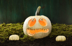 A Halloween Pumpkin With A Scary Zombie … – License Images regarding Zombie Face Pumpkin Carving