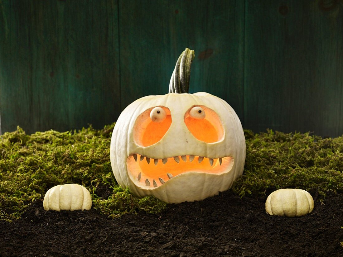 A Halloween Pumpkin With A Scary Zombie … – License Images within Zombie Faces For Pumpkins