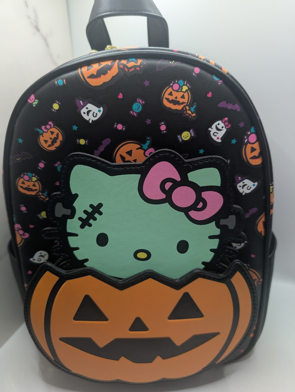 Her Universe Hello Kitty Zombie Pumpkin Glow-In-The-Dark Mini intended for Zombie Hello Kitty Pumpkin